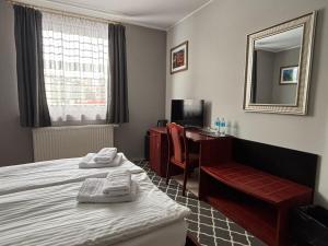 Llit o llits en una habitació de Hotel Ava