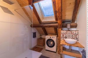 a bathroom with a sink and a window at Alesina in Montricher-Albanne +26 photos