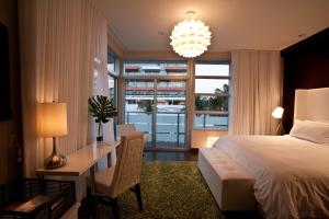Voodi või voodid majutusasutuse Prime Hotel Miami toas