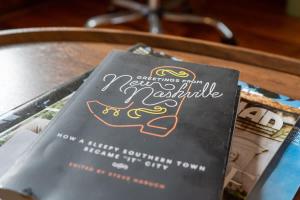 a book sitting on top of a table at Boscobel Bungalow in Nashville