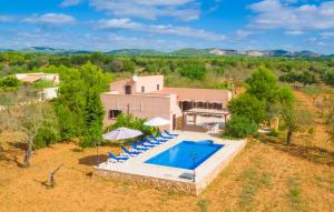 an aerial view of a villa with a swimming pool at Ses Comunes in Campos