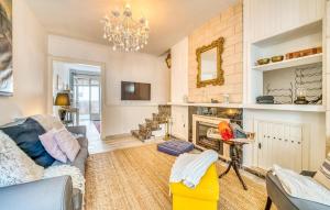 a living room with a couch and a fireplace at Ca Sa Batlessa in Artá +34 photos