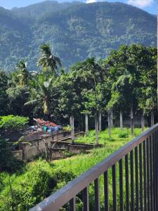 a balcony with a view of a mountain at HA Homes in Matale