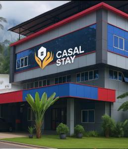 a building with a cason stay sign on it at Casal stay in Mannārakkāt