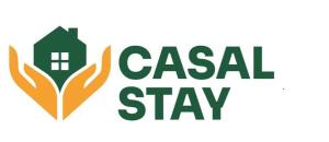 a logo for a real estate agency with a house at Casal stay in Mannārakkāt