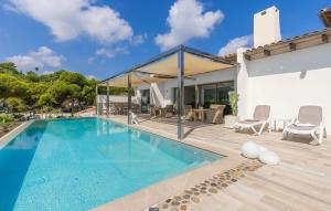 an image of a swimming pool in a house at Lifetime in Font de Sa Cala