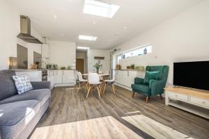 a living room with a couch and a tv at 2 Bed in Bush oc-h31844 in Bude