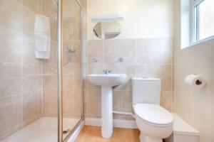 a bathroom with a toilet and a sink and a shower at 3 Bed in St. Merryn oc-r30137 in Saint Merryn +22 photos
