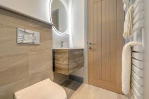 a bathroom with a toilet and a sink at 2 Bed in St. Ives oc-s28155 in St Ives +25 photos