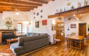 a living room with a couch and a fireplace at Can Bleio in Pollença +34 photos