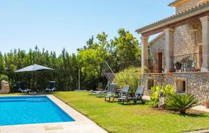 a villa with a swimming pool in a yard at Turixant Dalt in El Port de la Selva