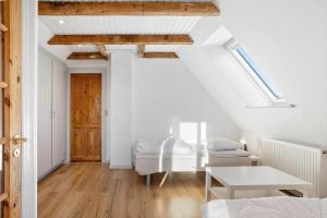 a bedroom with a bed and a table in a room at FY405-Millinge-Assensvej-422 in Faldsled