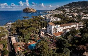 an aerial view of a resort next to the ocean at Grand Hotel Il Moresco in Ischia Town