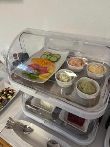 a refrigerator filled with different types of food at Gästezimmer Schupanez in Leutschach +15 photos