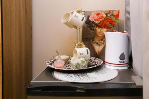 a table with a plate of food and a cup at king pyramids in Cairo