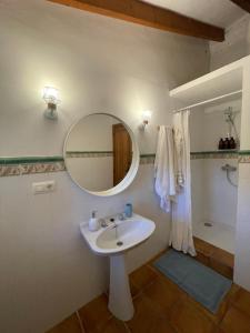 a bathroom with a sink and a mirror at Casita Molivent in Parcent +39 photos