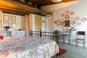 Postel nebo postele na pokoji v ubytování Casa Il Borghetto - Luxury Suites & Pool