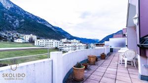 a balcony with a view of the mountains at Holidayapartment Kirchweg, Glis in Brig