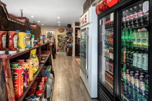 a store aisle with a lot of drinks and drinks at Sun Outdoors Arches Gateway in Moab