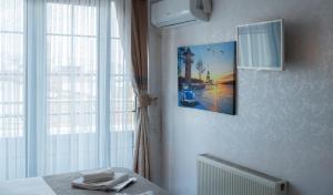 a room with a bed and a picture on the wall at Golden Horn Park Hotel in Istanbul +150 photos