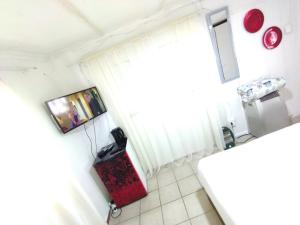 an overhead view of a bathroom with a sink at affordable room rustenburg in Kroondal