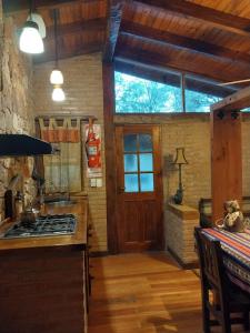 a kitchen with a stove top oven in a room at soy ahora segunda in San Javier