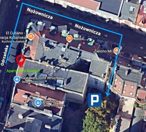 a map of a building with orange circles at Apartament Rustical in Wrocław