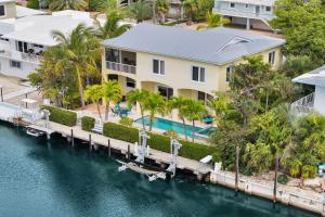 an aerial view of a house with a dock at Casa Mar in Islamorada