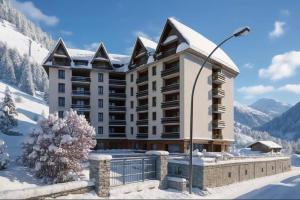 a hotel in the mountains with snow on the ground at La Lanterna sui Monti in Pragelato