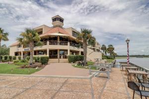 a large building with palm trees in front of it at Anchorage 7442 in Hilton Head Island