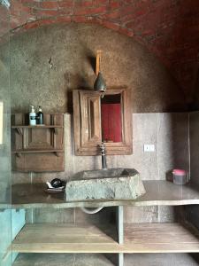 a kitchen with a sink and a counter top at Maison Nassimah in Giza +51 photos