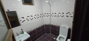 a bathroom with a sink and a toilet at Onur Termal in İhsaniye