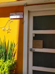 a door to a hotel with a sign on it at Villa Platino Doble in Pachuca de Soto