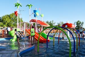 a group of people playing in a water park at Sierras de La Punta in La Punta