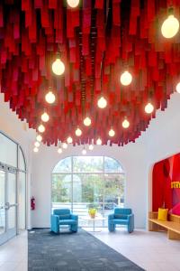 a large room with red hearts hanging from the ceiling at The Gallatin in Nashville +223 photos