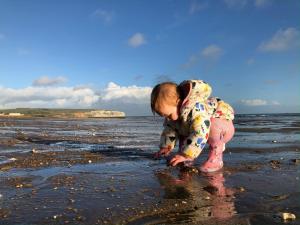 a little girl playing in the sand on the beach at Sandringham Hotel - Seafront, Sandown, Isle of Wight - FREE CAR FERRY TICKET for 3 Nts, 1-2 Nts from 109 Pounds in Sandown +37 photos