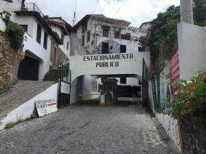 an entrance to a building on a street at Casa del Patrón Posada in Taxco de Alarcón