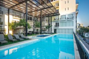 an image of a swimming pool in a building at Life Bucerias in Bucerías