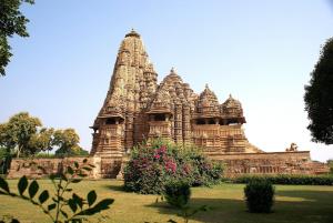 a large stone building with a tower at Shree mahal in Jāmb