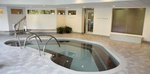 a jacuzzi tub in a building with a lobby at Condo Right on the Snowbird Slopes! in Sandy