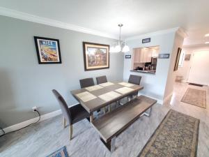 a dining room with a table and chairs at Summerhouse 218 condo in St. Augustine