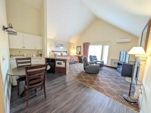 a large living room with a kitchen and a bedroom at The Falls Motel - 2 Mi to " Watkins Glen State Park, Wineries " and 4 Mi to Watkins Glen International Track " The Glen " in Watkins Glen
