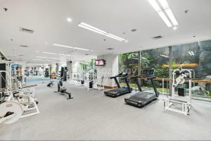 a gym with several treadmills and cardio machines at Rosen by Kozystay - Thamrin in Jakarta