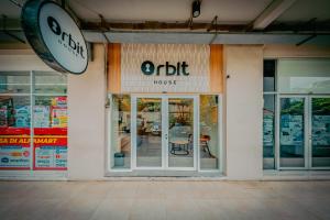 a store front of a store with a sign on it at Orbit House in Bandung