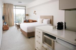 Postel nebo postele na pokoji v ubytování Nautica Residences Fremantle