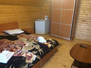 Postel nebo postele na pokoji v ubytování Sribni Rosy