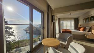 a hotel room with a view of the water at Reev Coffee House in Antalya