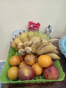 a basket of fruit sitting on a table at Sunset Backpackers Hostel in Nongkhiaw