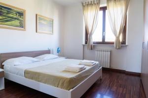 Postel nebo postele na pokoji v ubytování Adamo ed Eva Resort