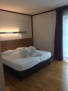 Postel nebo postele na pokoji v ubytování Al Marinaio Hotel Garni